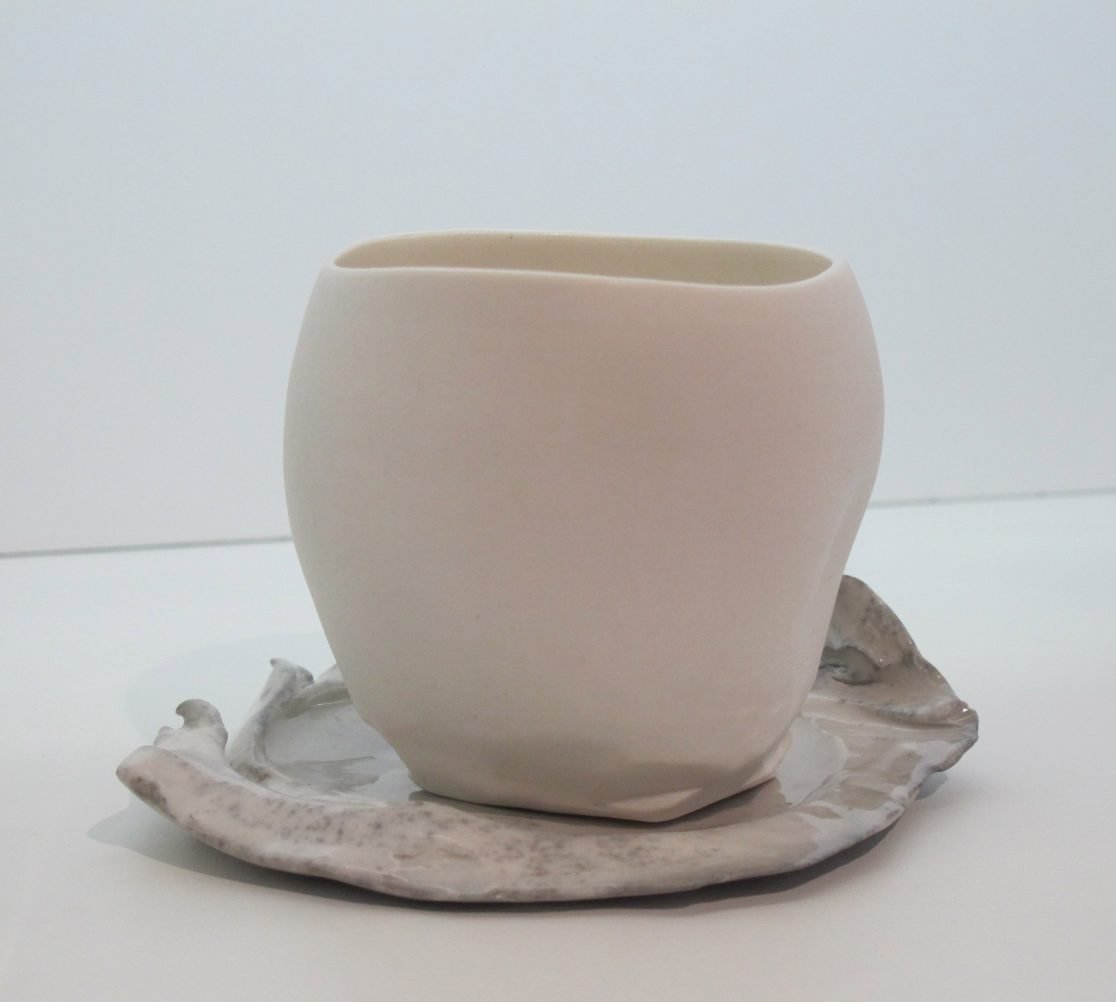 White cup, grey saucer